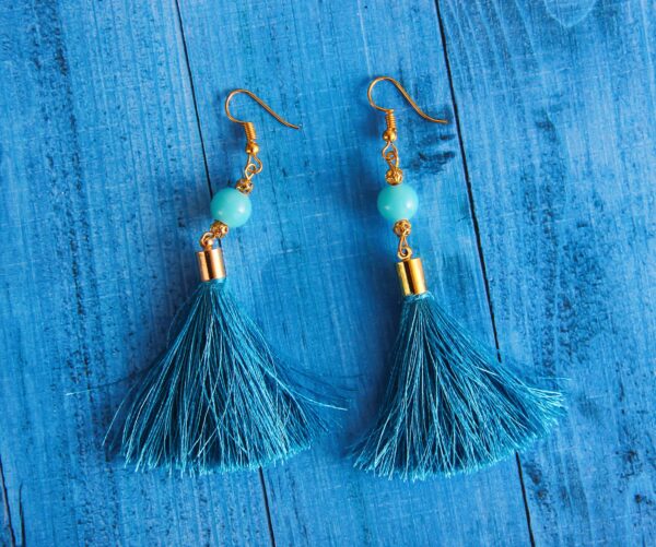 boucles pompons turquoises